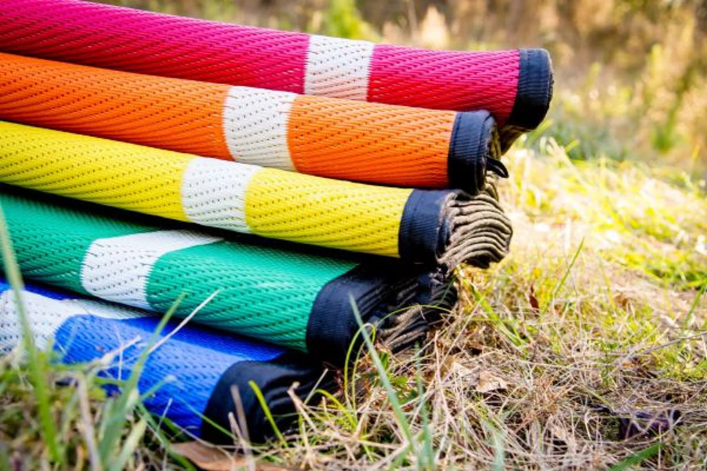 Recycled Plastic Indoor & Outdoor Rug with plastic carry bag: Sunset Orange 5' x 7'