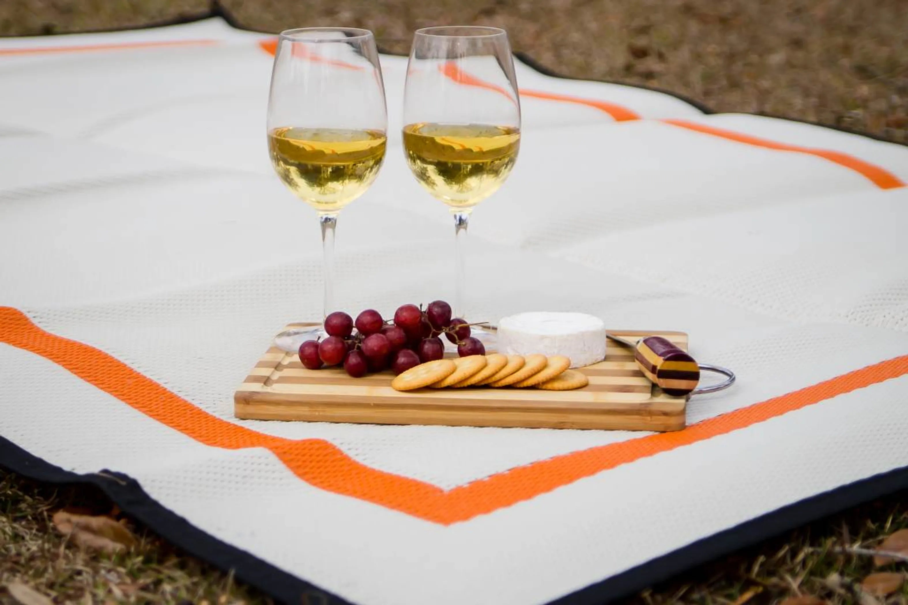 Recycled Plastic Indoor & Outdoor Rug with plastic carry bag: Sunset Orange 5' x 7'